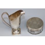 Victorian hallmarked silver topped glass dressing table jar, engraved with scrolls around a