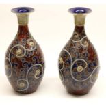 George Tinworth (1843-1913) For Doulton Lambeth, a pair of mallet shaped stoneware vases, with