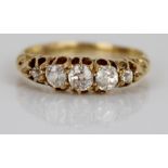 18ct yellow gold five stone diamond ring, the round cut graduating diamonds in claw settings, on