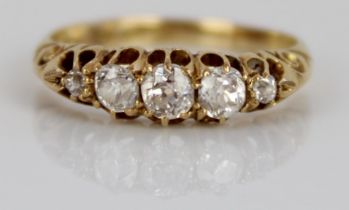 18ct yellow gold five stone diamond ring, the round cut graduating diamonds in claw settings, on