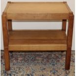 Martin Lizardman Dutton of Huby - an oak two tier trolley, joins as two tables, on casters, carved