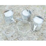 Three galvanized steel watering cans and 2 wire lattice plant liners