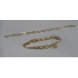 9ct yellow gold heart link bracelet, L19cm, and a 9ct yellow gold gate bracelet with heart padlock