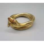 14ct yellow gold flexible snake bracelet, the head with engraved detail, set with ruby eyes,