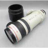 A Canon EF 100-400mm f/4.5-5.6 L IS lens, ET-83C hood