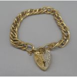 9ct yellow gold charm bracelet with white and yellow gold heart padlock clasp set with diamonds,