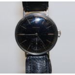 1941 Longines chromed hand wound wristwatch, signed black dial with copper tone baton hours and