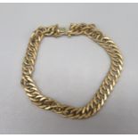 Yellow metal flat curb link bracelet, clasp stamped 375, 11.4g