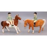 Beswick figures: boy on palomino pony No. 1500, and a girl on a skewbald pony No. 1499, max. H14.5cm