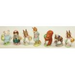 Beswick Beatrix Potter figures: Mrs Rabbit x 2, Squirrel Nutkin, Foxy Whiskered Gentleman, Cousin