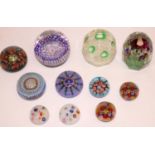 Collection of mid-late C20th glass paperweights, predominantly millefiori, including one with a