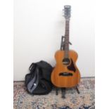 Kimbara model no. 2/6, serial no. 11031, 6 string acoustic guitar with black leather strap, TKL