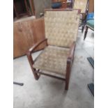 C20th Shetland Croft style open arm chair with woven straw seat and back