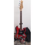 Unnamed red bass guitar, bolt on neck, with USA flag decorated strap, in black carry bag and a 'Play