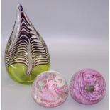 Two WhiteFriars no. 9851 glass paperweights with controlled bubbles, D8cm; and a piece of tear