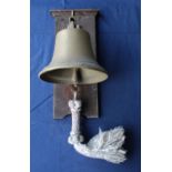 'LAST ORDERS' Brass bell with floral design around the sound bow and platted rope attached to