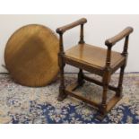 C20th oak monks chair, with circular carved folding top on turned supports with sledge feet, W68cm