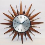 Early 1970's Metamec sunburst wall clock, signed silvered dial with applied Arabic and baton hour