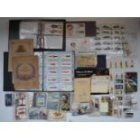 Collection of mostly military related vintage cigarette cards, postcards and stamps incl. Players