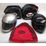 MDS and MOVO motorcycle helmets in 2 black leather Bell helmet bags, with a red Bell Custom 500