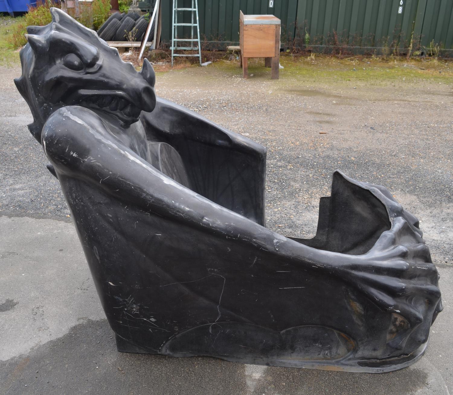 Unfinished fibre glass fairground ride gondola in the form of a Gothic dragon