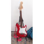 Squire Strat, made in China, electric guitar with bolt on neck, serial no. CY99046237, pink