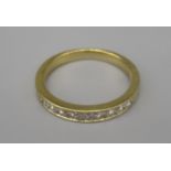 18ct yellow gold half eternity ring set with diamonds, stamped 750, size O, 3.8g