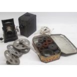 Cine Film reel player with tin of Cine film reel (a/f)