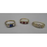 9ct yellow gold ruby and diamond ring, size K1/2, a 9ct gold sapphire and clear stone ring, size