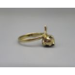 9ct yellow gold ring in the form of a cat with ruby set eyes, stamped 375, size K1/2