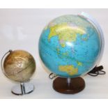 C20th German illuminated terrestrial globe on turned teak base H39cm and smaller globe on chrome