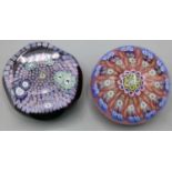 Perthshire carpet ground glass paperweight, containing six large millefiori canes, signature cane