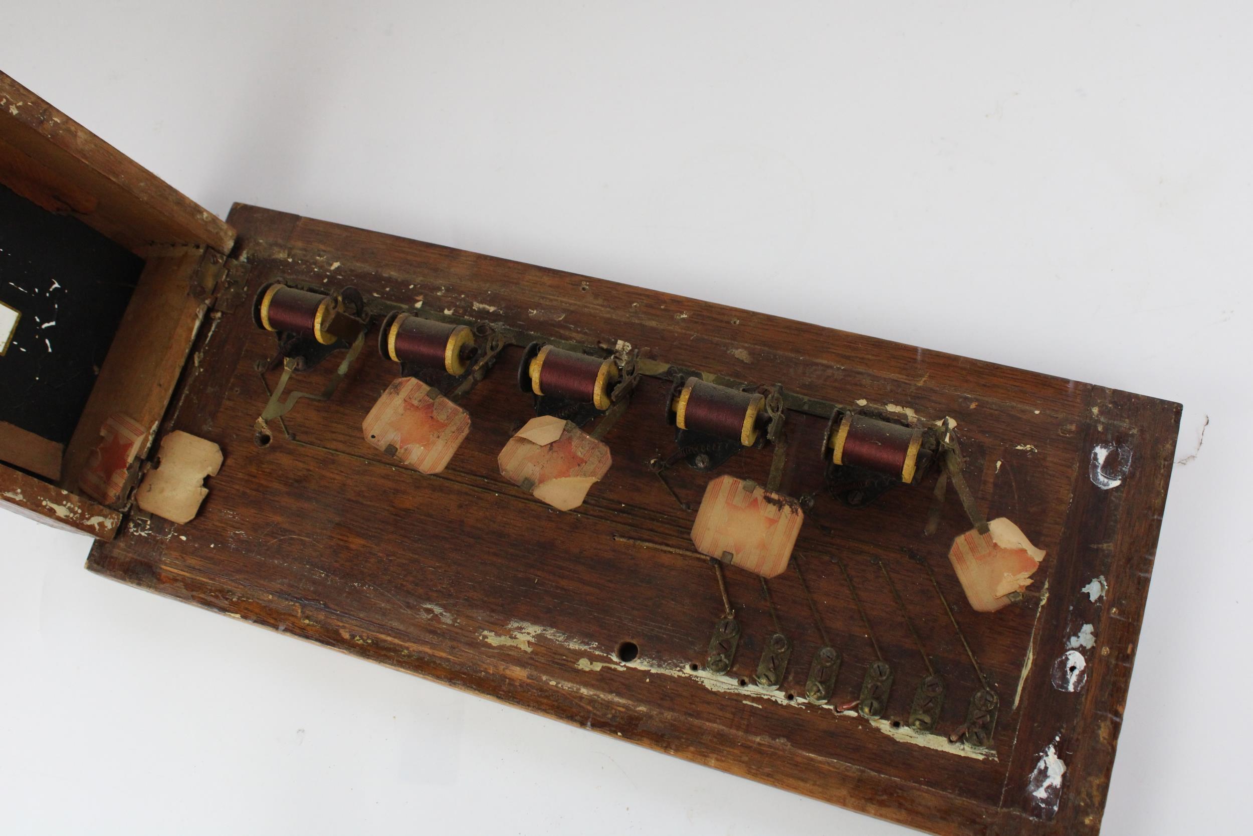 Early C20th electric servants bell board of five windows in mahogany frame and backboard, W44cm - Image 2 of 2