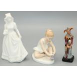 Royal Doulton figures: The Jester HN3335 H9.5cm, Ballet Shoes HN3434 H9.5cm, and a figure of a