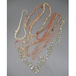 Eight mother of pearl and coral style necklaces