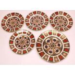 Royal Crown Derby 1128 Old Imari dinnerware: four D21.5cm plates and one D27cm plate (5)