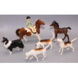 Beswick figures: girl on a skewbald pony No. 1499, border collie H7.5cm, bay foal H11cm, and three