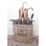 Wicker shell carrier with four green metal shell cases, painted Nr0912 and and 0830., and a