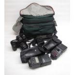 Canon EOS 3 with 28-105mm Ultrasonic lens and a photographers carry bag cont. flashes, lens cleaner,