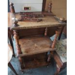 Victorian walnut what- not, three tiers with Tunbridge ware banding on turned supports with castors,