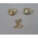9ct yellow gold cameo ring, size L, a 9ct gold ring set with cabochon oval, size J1/2, and a 9ct