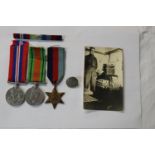 The War Medal 1939-45, Defence Medal, 1939-45 Star. A.R.P. Tunic button and Photo' of T. Shoesmith.