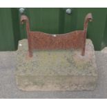 Vintage iron boot scraper in concrete base