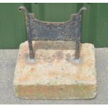 Vintage iron boot scraper in reconstituted base