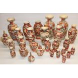 Large collection of Japanese Satsuma pottery wares, predominantly vases, typically decorated with