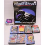 16 Bit Sega Mega Drive games console with SV-434 SG ProPad and seven games.