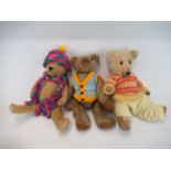 Three early C20th British teddy bears in knitted outfits