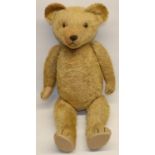 Mid C20th blonde mohair teddy bear, with woolwork nose and felt pads, H67cm