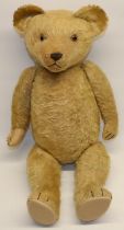 Mid C20th blonde mohair teddy bear, with woolwork nose and felt pads, H67cm