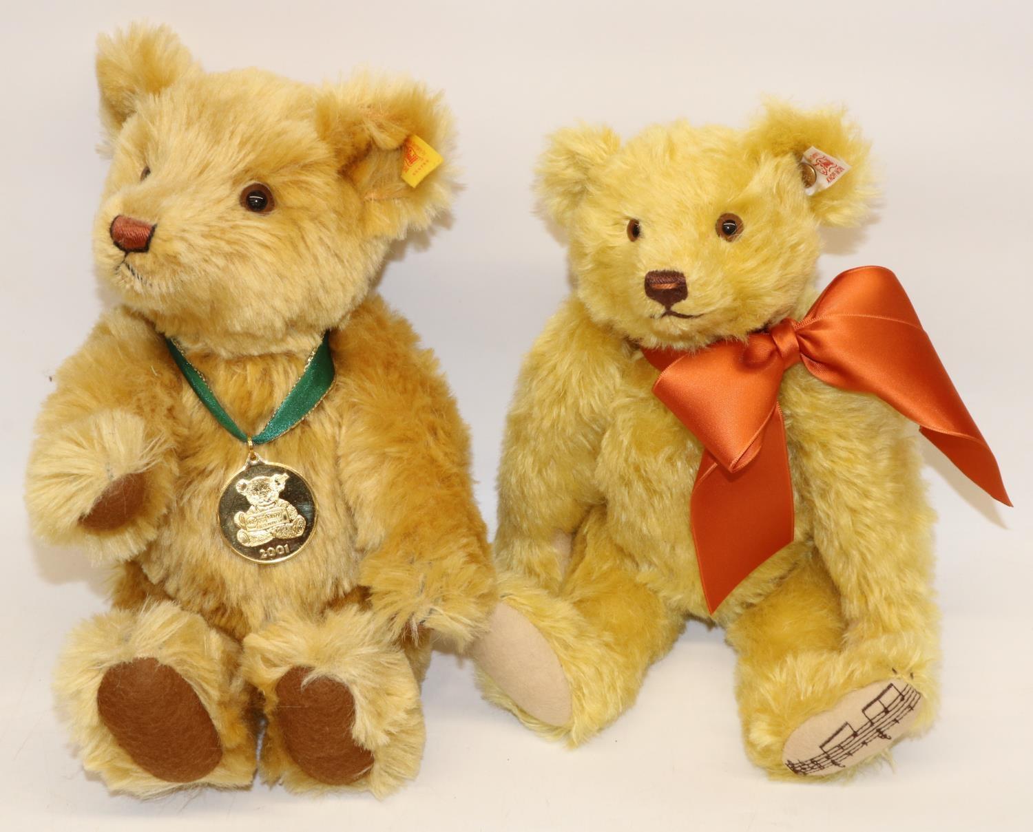 Two Steiff teddy bears: Danbury Mint 2001 bear, and a 2007 musical bear with orange ribbon, max.